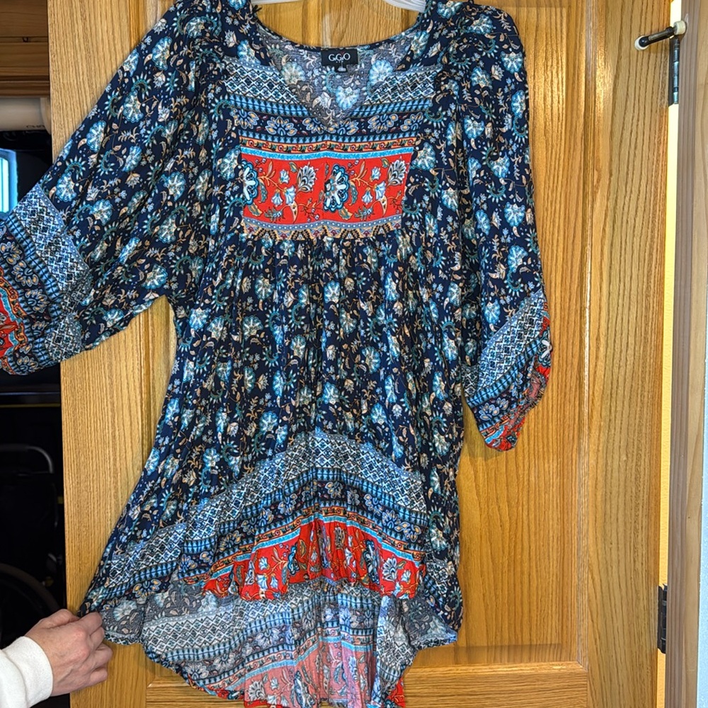 Gigio brand women’s size small thats fitted bust are flowy bottom more of a top